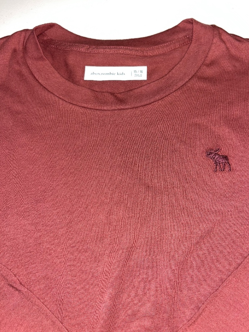 Abercrombie kids burgundy long-sleeve crewneck t-shirt with moose logo